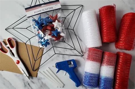 Tie this bundle onto one end of your wreath form. . Dollar tree plastic wreath board